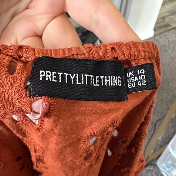 PrettyLittleThing Orange Eyelet Halter Romper - Picture 7 of 8